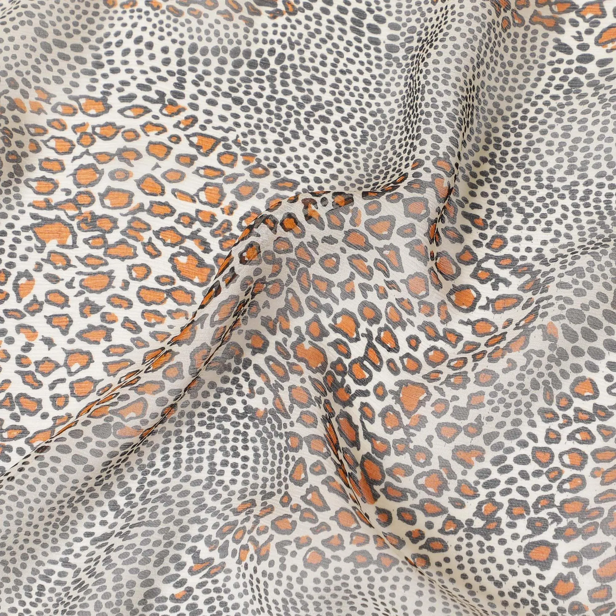 Beige pure silk chiffon fabric with black and squash orange print in animal skin design-D9306